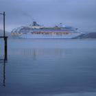 <i>Sea Princess </i>passes Hamilton Bay as it enters Otago Harbour yesterday, heralding the start...