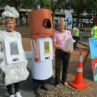 Keep Dunedin Beautiful co-ordinator Darlene Thomson (right) and volunteers dressed as chewing gum...