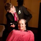 Laura Murdoch-Marshall has her head shaved by her husband Brent Marshall during the couple's...