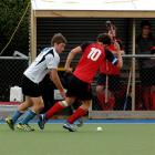 Northern player James Coughlan (left) and Canterbury skipper Tom Loudon jostle for possession as...