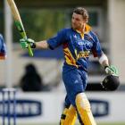 State Otago Volts cricketer Brendon McCullum waves to the crowd as he passes the highest New...