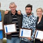 The rescuers with their awards  for saving the lives of  Columba College pupils at Canoe Beach,...