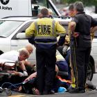 A cyclist broke her leg when she was trapped under a car. Photo / APNZ