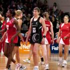 A dejected Irene van Dyk (centre) makes her way to the sideline after the Silver Ferns were upset...