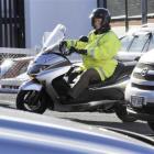 A Dunedin City Council parking officer patrols the upper Moray Pl car park. Photo by Gerard O'Brien.