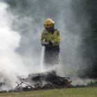 A firefighter on Earnscleugh Rd, near Clyde. Alexandra and Clyde volunteer firefighters attended...