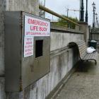 A fisherman is not deterred by the absence of emergency lifebuoys on Customhouse Quay yesterday....