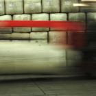 A forklift moves bales in a wool store. New Zealand Wool Services International believes timely...