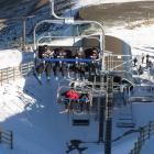 A group of young and keen skiers were the first on the new Meadows Express chairlift at Coronet...