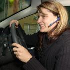 A hands-free cellphone car kit can cost as little as $35. Photo by Jane Dawber.