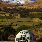 A hay bale in Glenorchy spreads a message of opposition to the proposed  Milford Dart  tunnel....