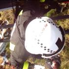 A Helicopters Otago crew member winches a Christchurch man to safety after the 4WD vehicle he and...