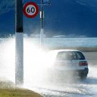 A high tide of 2.4m causes flooding on the corner of Portsmouth Dr and Teviot St at lunchtime...