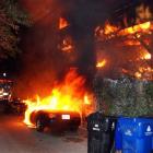 A Los Angeles Fire Department engine arrives at a fire started by an arsonist in the Laurel...