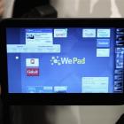 A man holds a WePad during its soft launch in Germany last week. The official launch is scheduled...