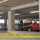A man is taken into custody by police in a car park near central Dunedin's Work and Income New...