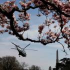 A Marine One helicopter carries US President Barack Obama away from the White House in Washington...