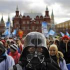 A member of the pro-Kremlin youth movement Stal (Steel) wearing a Darth Vader mask participates...