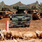 A mobile missile launcher is positioned at a military base on the Turkish-Syrian border in Suruc,...
