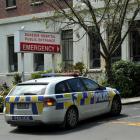 A Mosgiel police car takes a seriously injured boy to Dunedin Hospital yesterday. PHOTO:...