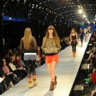 Christina Heye (18) models Cherry Cotton Candy on the catwalk. Photo by Linda Robertson.