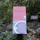 A new interpretive sign informs visitors to the legume border at the Dunedin Botanic Garden....