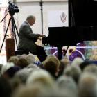 A packed St Paul's Cathedral audience enjoys pianist Michael Houstoun in the first St Paul's at...