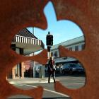 A pedestrian makes her way across the Cargills Corner intersection of Hillside Rd and King Edward...