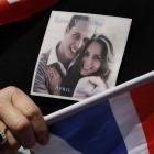 A picture of Prince William and Kate Middleton is seen on the T-shirt, and a ring similar to that...