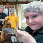 A plan to charge a fee for registered public sausage sizzles has  Green Island pupils (from right...