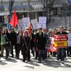 A protest rally marches on Princes St, Dunedin, on Saturday, in opposition to  the possible...