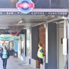 A security guard stands outside the Metro Bar, the bar run by former bankrupt Ben Hanssen. Photo...