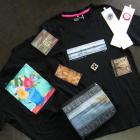 A selection of the Art for Life T-shirts created by local artists that will be up for silent...