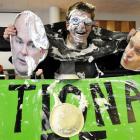 A shaving-cream pie-covered Logan Edgar, president of the Otago University Students' Association,...