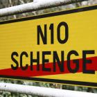 A street sign marks the end of the small Luxembourg village of Schengen last week. The Schengen...