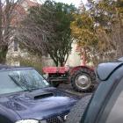 A tractor and two vehicles yesterday block road access  to the chapel (background) at the former...