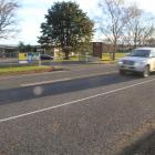 A vehicle passes Clutha Valley Primary School yesterday. The  speed limit for the 400m stretch of...