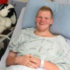 Aaron injured his back and pelvis when he fell into a blowhole at Muriwai. Photo / Chris Gorman