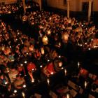 About 800 people celebrate the festive season by candlelight at Knox Church on Christmas Eve....