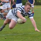 Action from the OBHS v St Kevin's College match at University Oval in Dunedin. Photo Peter McIntosh