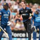 Adam Milne celebrates taking the wicket of Kumar Sangakkara. Photo Getty Images