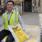Adveco general manager New Zealand Andrew Protheroe with a lump of raw material and some bagged...
