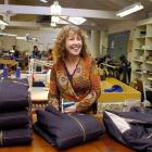 Adventure Outfitters' managing director Ruth Mullenger checks a newly completed line of jackets...