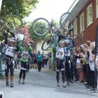 Adventure racingTeam Seagate raise their mountain bikes in triumph after winning the Godzone...