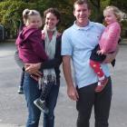Adventurer Jamie Fitzgerald with his family.  His wife, Kate, holds Charlotte and  Jamie holds...