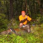 Hunter Safety Lab Ltd founder and chief executive Michael Scott with a deer in the Nelson Lakes,...