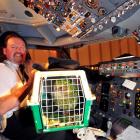 Air New Zealand captain Eric Fontein shows  Sirocco the cockpit. Photo by Craig Baxter.