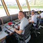 Airways New Zealand staff members (from left) air traffic controllers Andrew Turner and Nick Gale...