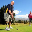 Alan Dearden, of Cromwell (left), and Lee Ngauamo, of Auckland, prepare for the amputee golf...