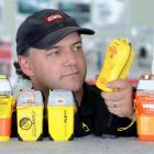 Alan Wilden, of Navcom Ltd, in Dunedin, inspects a selection of the new distress beacons. Photo...